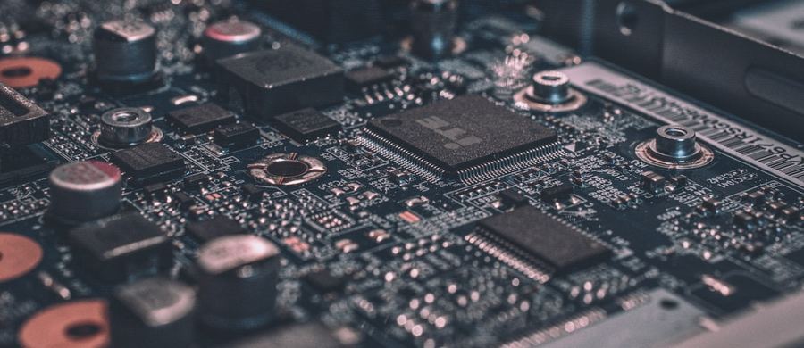 Close-up of a circuit board for machine and agent secrets